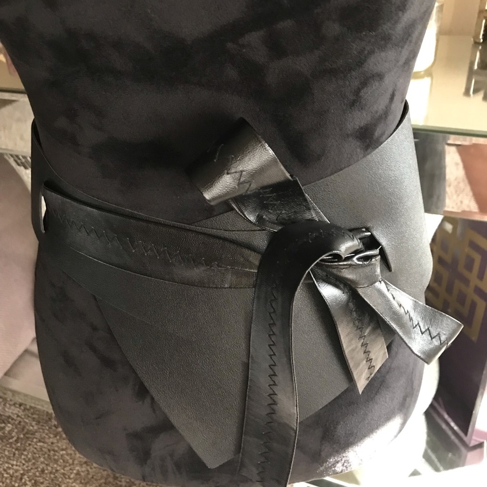 Wide asymmetrical belt